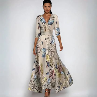 Woman wearing a floral dress with a plain background