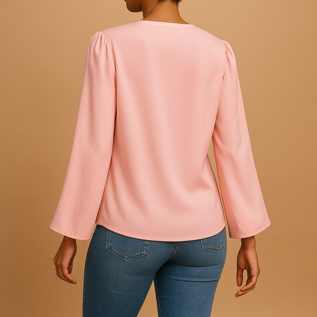 Airy women’s blouse with a V-neck and puff sleeves, ideal for casual days, summer outings, or elegant dinners.