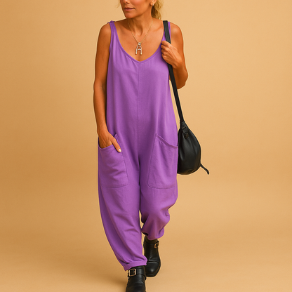Woman wearing a loose-fit airy summer dress in a lightweight fabric, perfect for warm days and relaxed summer outings.