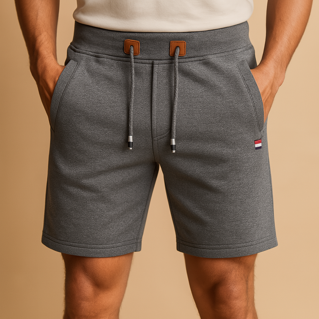 Breathable athletic shorts for men with multiple pockets and elastic waistband, ideal for sports, travel, and everyday comfort.