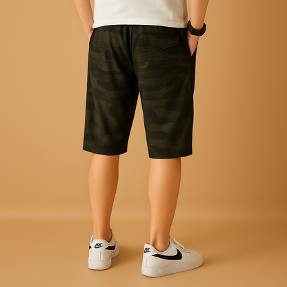 Men’s camouflage cargo shorts with multiple pockets, ideal for hiking, camping, and everyday outdoor wear.