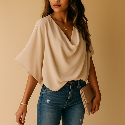 Women’s chiffon blouse with batwing sleeves and a v-neck, offering a relaxed fit for everyday wear, work, or casual outings.