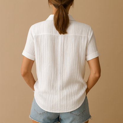 Women’s classic short sleeve blouse with a relaxed fit and chest pocket, designed for warm days and versatile everyday outfits.