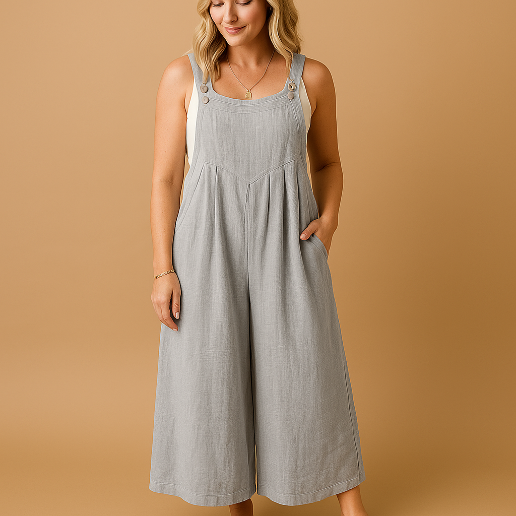 Woman wearing a loose-fit cotton overall with adjustable straps, designed for breathable comfort and casual summer outings.