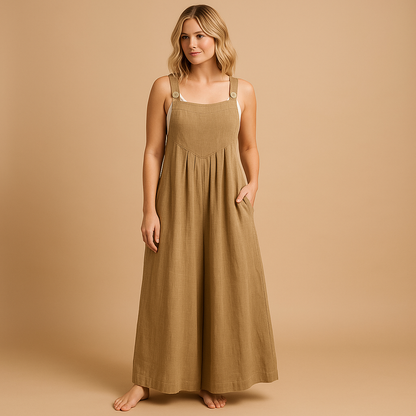 Woman wearing a loose-fit cotton overall with adjustable straps, designed for breathable comfort and casual summer outings.