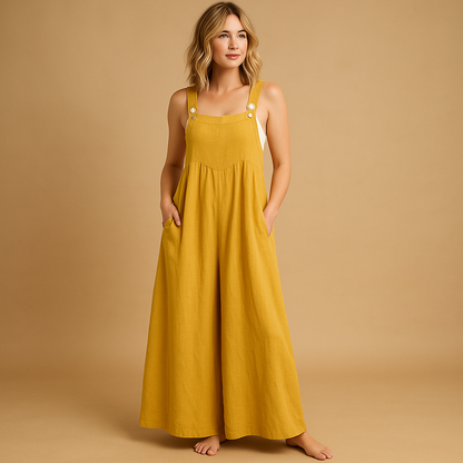 Woman wearing a loose-fit cotton overall with adjustable straps, designed for breathable comfort and casual summer outings.
