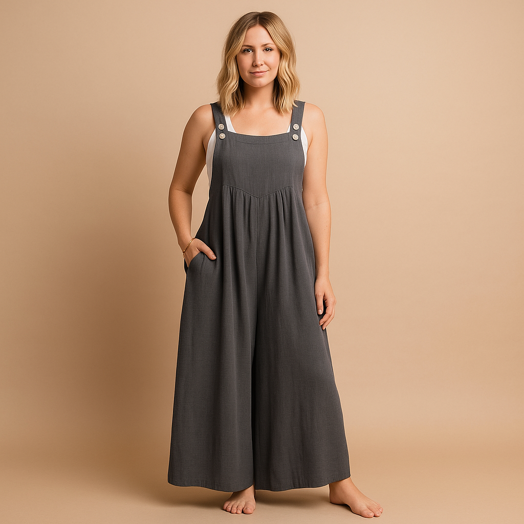 Woman wearing a loose-fit cotton overall with adjustable straps, designed for breathable comfort and casual summer outings.