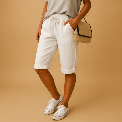 Elastic waist capri trousers for women with relaxed fit and rolled hem, perfect for casual summer outfits, daily wear, and comfortable warm-weather style.