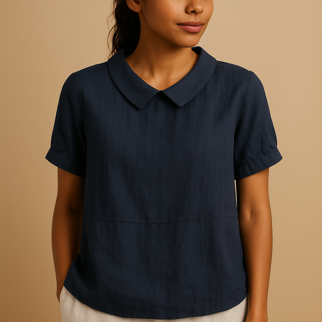 Elegant tailored blouse for women with a classic design, suitable for office outfits, formal occasions, and smart casual wear.