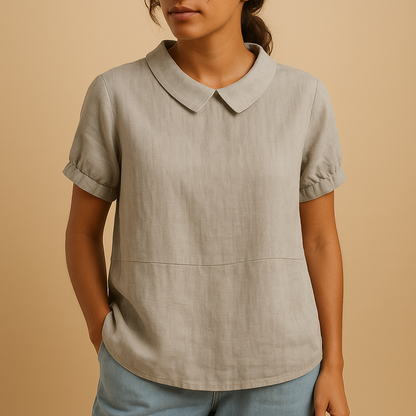 Women’s elegant tailored blouse with a classic design, ideal for office outfits, formal occasions, and smart-casual styling.
