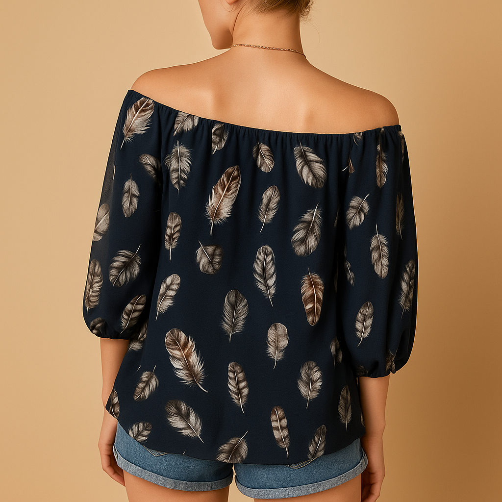 Feather print v-neck blouse for women with a relaxed fit and breathable feel, suitable for casual summer outfits and everyday wear.