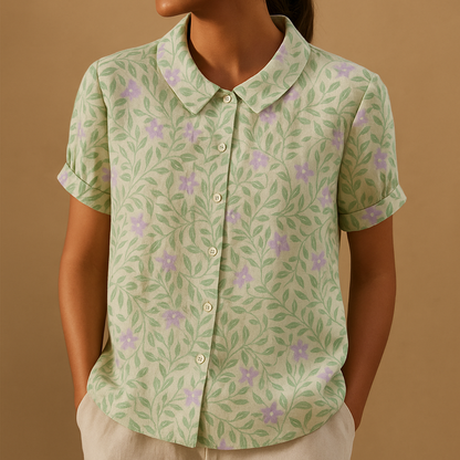 Women’s floral blouse with relaxed fit and breathable fabric, featuring a multicolor flower print for casual and warm-weather outfits.