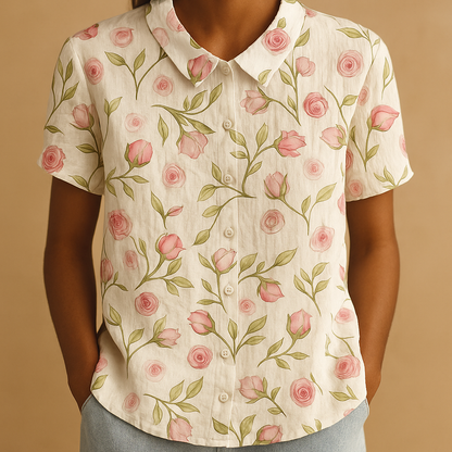 Women’s floral blouse with relaxed fit and breathable fabric, featuring a multicolor flower print for casual and warm-weather outfits.