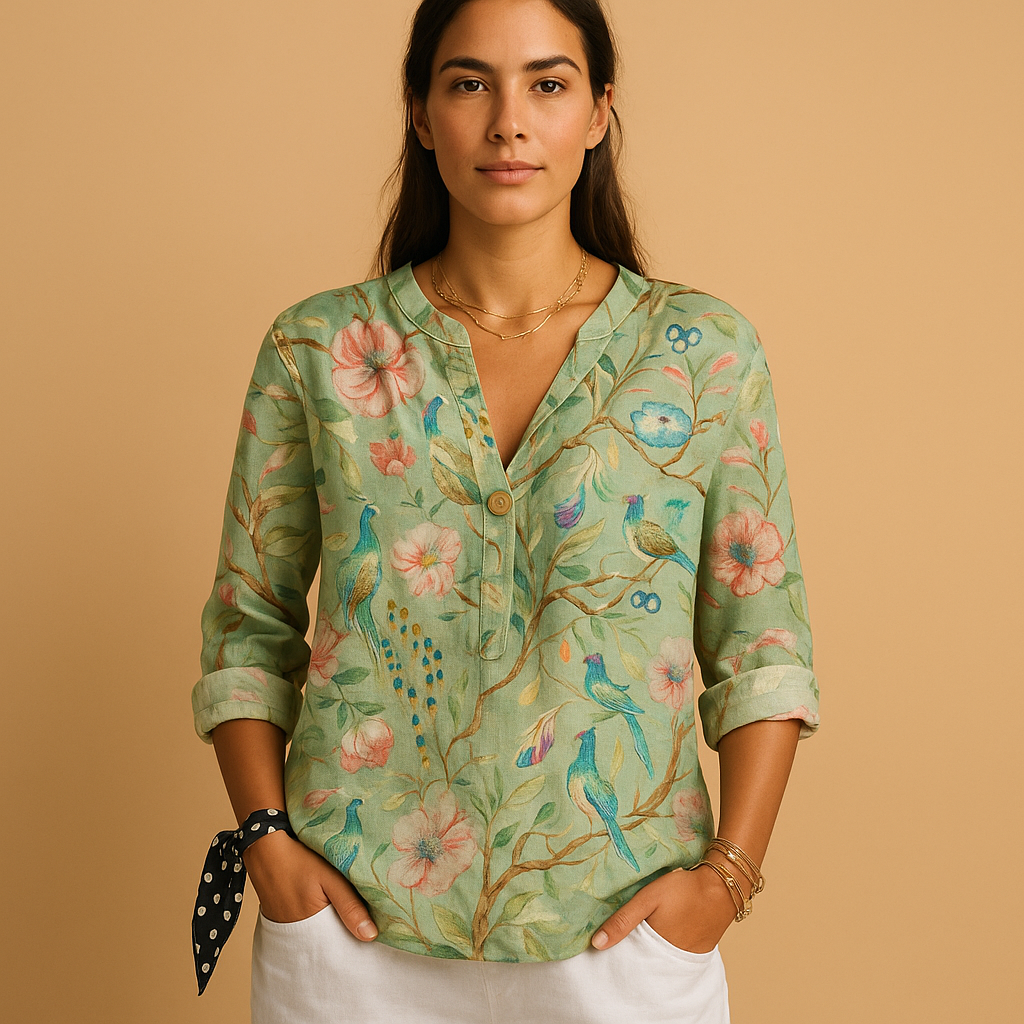 Women’s floral button-up blouse with a classic collar, airy fit and soft floral patterns, ideal for casual, business and summer outfits.