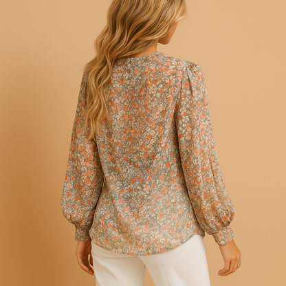 Women’s floral print summer blouse with long sleeves and a loose fit, ideal for warm days, work outfits, and casual summer looks.