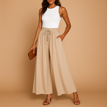 High waist wide leg trousers for women with elastic waistband and elegant silhouette, ideal for work outfits, casual looks, and modern everyday style.