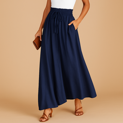 High waist wide leg trousers for women with elastic waistband and elegant silhouette, ideal for work outfits, casual looks, and modern everyday style.