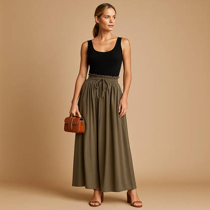 High waist wide leg trousers for women with elastic waistband and elegant silhouette, ideal for work outfits, casual looks, and modern everyday style.