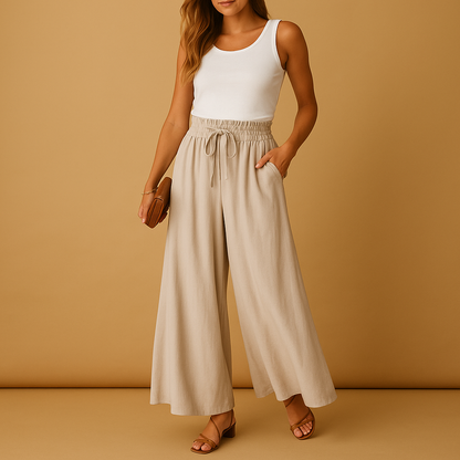 High waist wide leg trousers for women with elastic waistband and elegant silhouette, ideal for work outfits, casual looks, and modern everyday style.