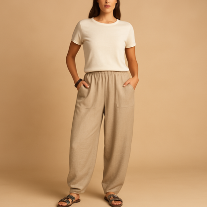 High-waisted boho summer trousers for women with a loose flowing fit and functional pockets, ideal for beach days, travel, and relaxed summer outfits.