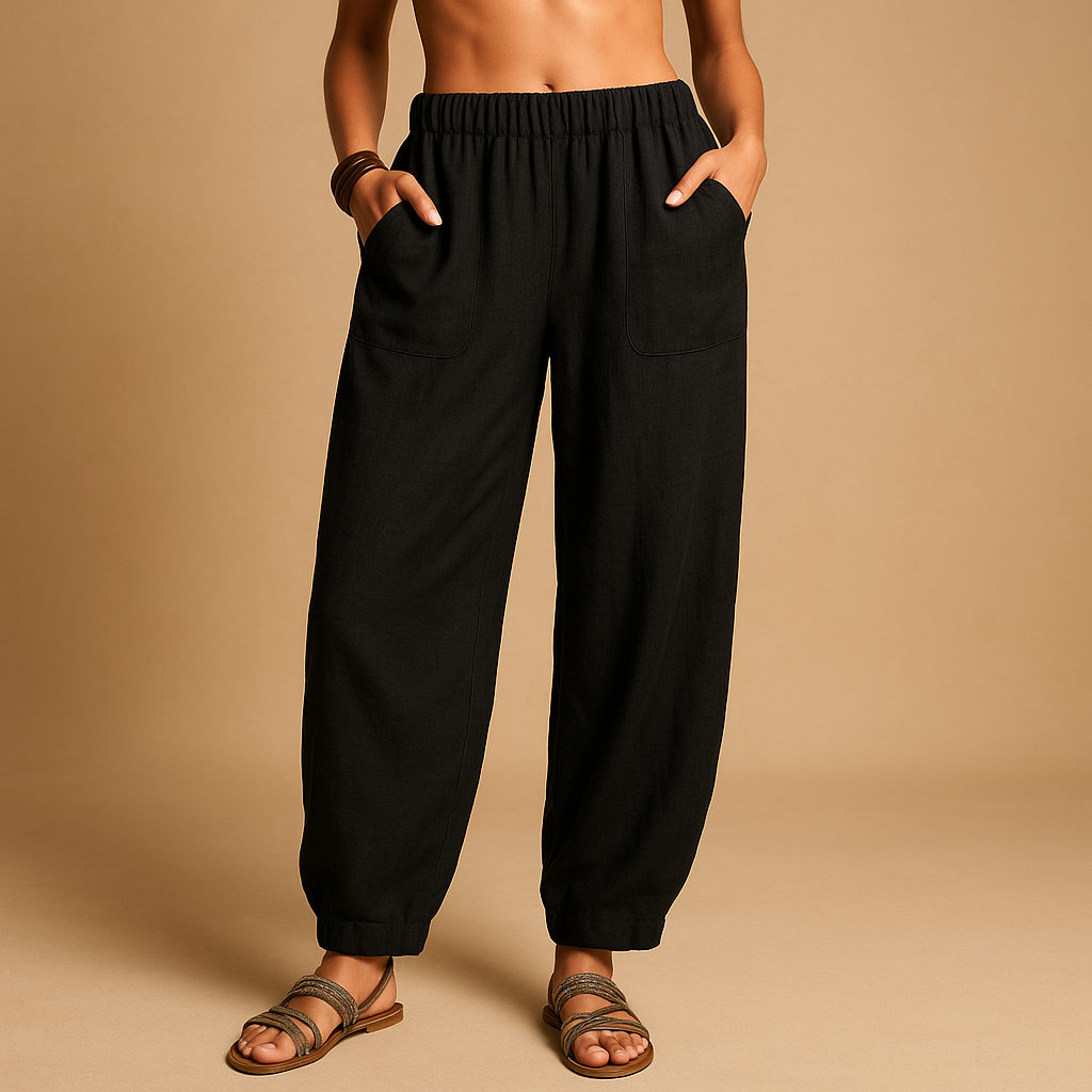 High-waisted boho summer trousers for women with a loose flowing fit and functional pockets, ideal for beach days, travel, and relaxed summer outfits.
