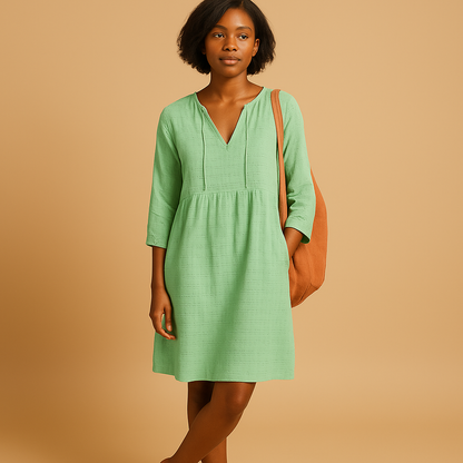 Knee length summer midi dress for women with short sleeves and soft cotton blend fabric, ideal for casual outings and formal occasions.
