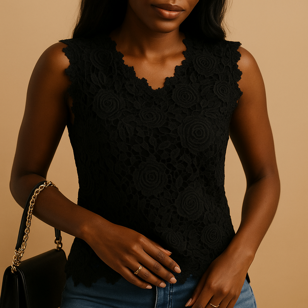 Women’s lace blouse with relaxed fit and round neckline, featuring elegant lace details in multiple colors.
