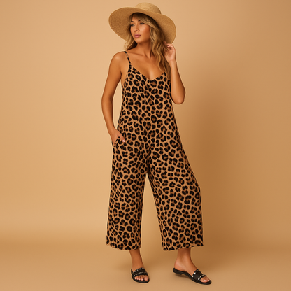 Woman wearing a leopard print halter jumpsuit with an airy comfortable fit, perfect for summer days and vacations.