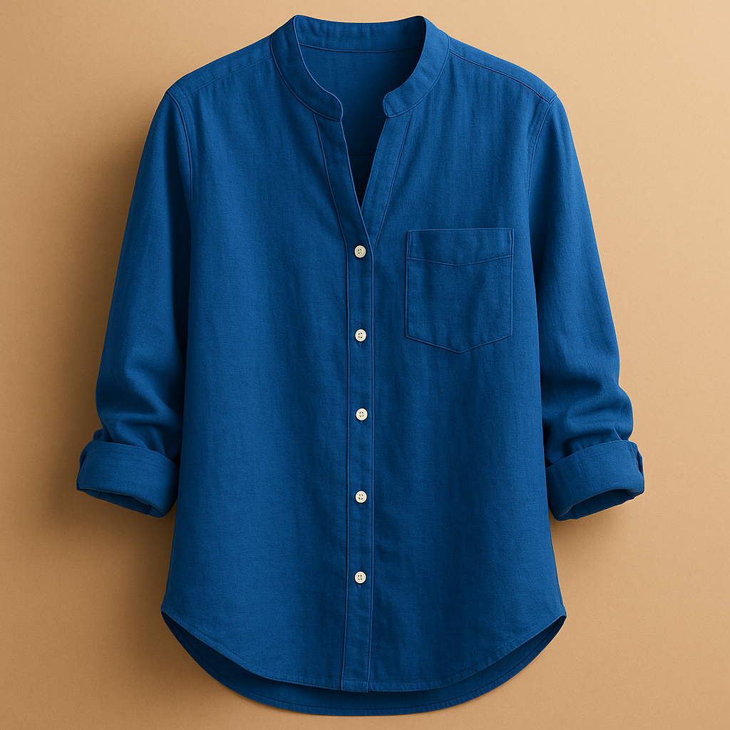 Women’s lightweight long sleeve shirt with tailored fit, breathable fabric, and classic button-down design for casual or formal wear.
