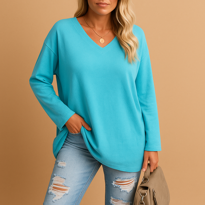 Lightweight summer top for women with a relaxed fit and short sleeves, suitable for casual wear, warm days, and everyday summer outfits.