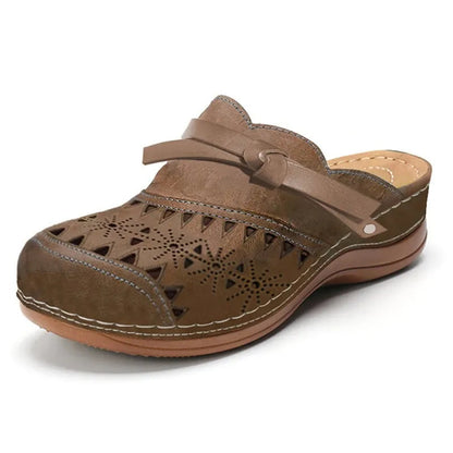 Image of Lola | Women's Bow Accent Cutout Slip-On Clogs