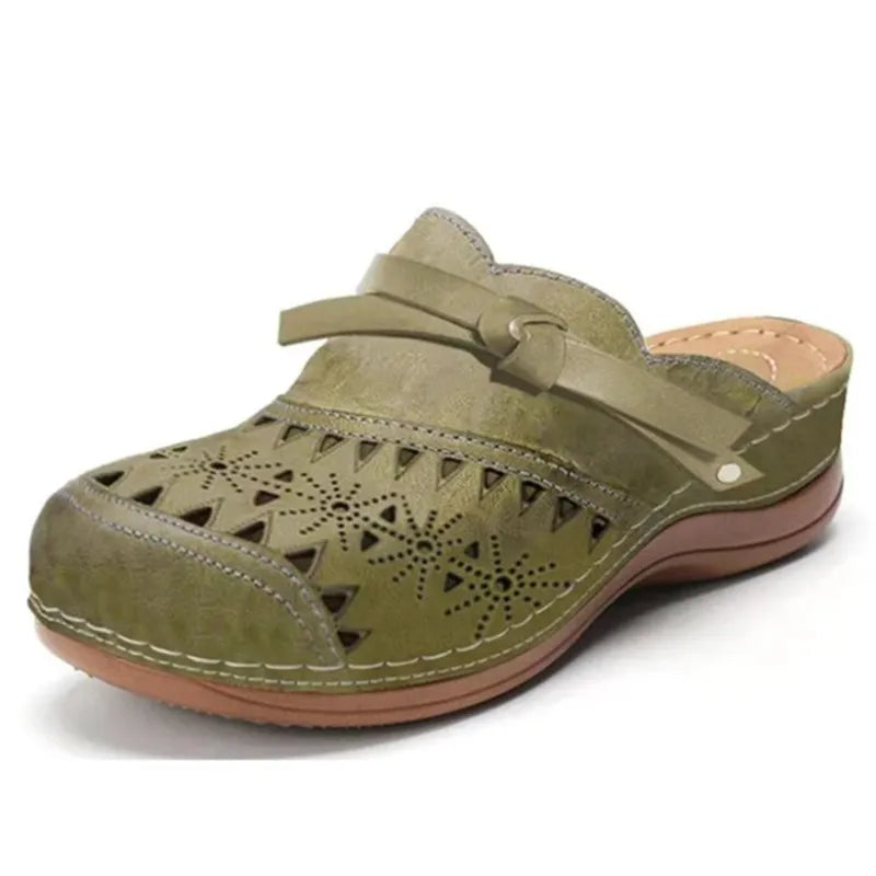 Image of Lola | Women's Bow Accent Cutout Slip-On Clogs