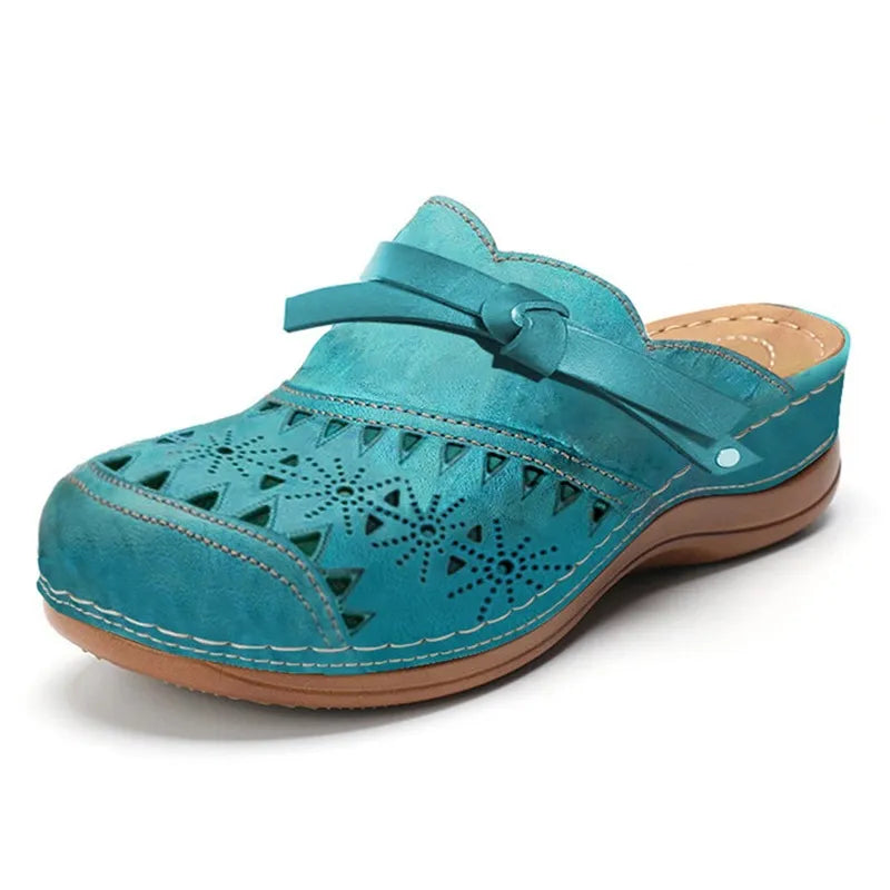 Image of Lola | Women's Bow Accent Cutout Slip-On Clogs