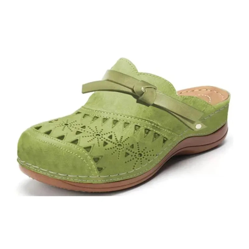 Image of Lola | Women's Bow Accent Cutout Slip-On Clogs