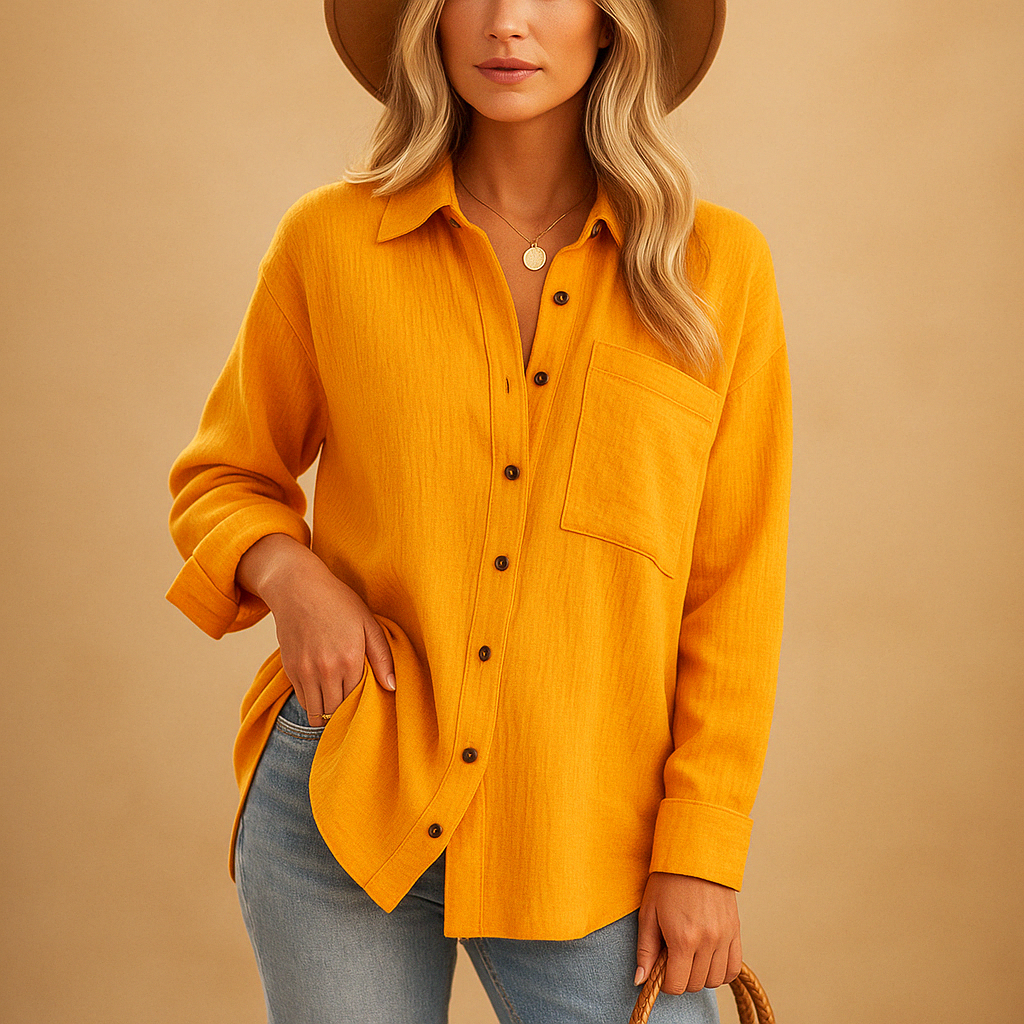 Women’s long sleeve polo shirt with a relaxed fit, classic collar, button closure, and chest pocket, suitable for work and casual everyday wear.