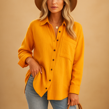 Women’s long sleeve polo shirt with breathable cotton blend, classic collar, and comfortable loose fit for everyday wear.