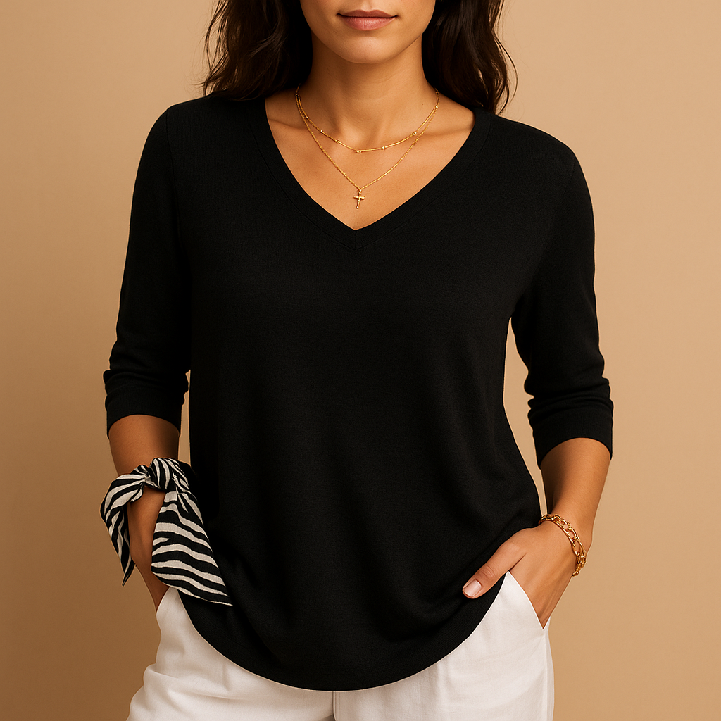 Women’s loose-fit luxury top with soft high-quality fabric and an elegant modern silhouette, ideal for casual and everyday wear.