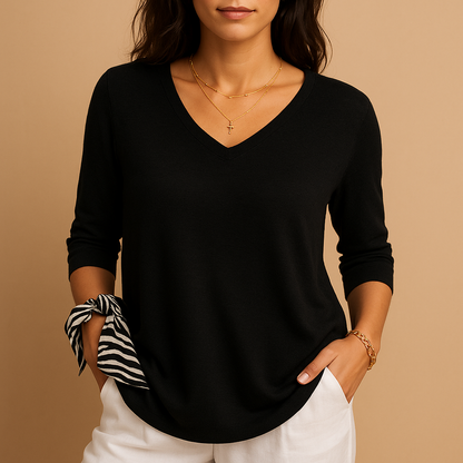 Women’s luxury loose-fit top with a modern elegant silhouette, designed for everyday comfort, casual outings, and relaxed moments.