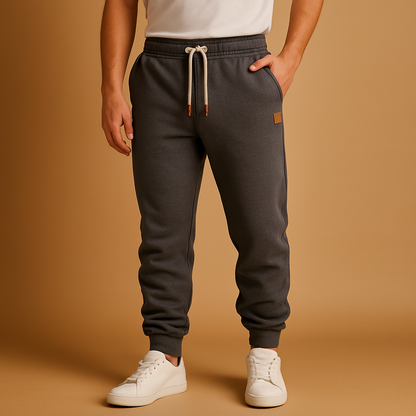 Men’s jogger sweatpants with adjustable waistband and side pockets, perfect for workouts, casual wear, and relaxing at home.