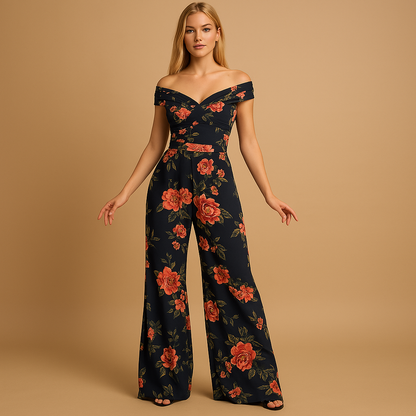 Woman wearing an off-shoulder floral jumpsuit with a tailored silhouette and blue-red print, ideal for weddings, ceremonies, and summer events.