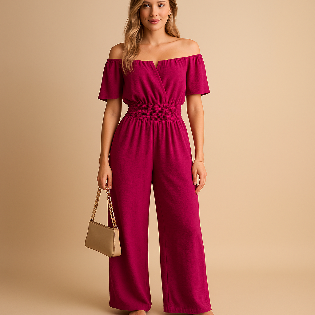 Woman wearing an off-shoulder pleated jumpsuit with an elastic waist, perfect for summer events, beach days, and casual chic outfits.