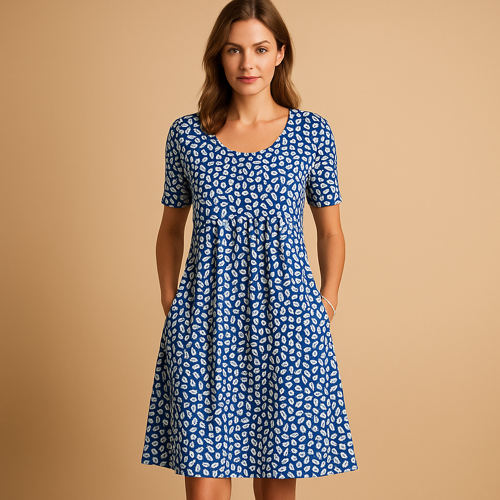 Printed cotton midi dress for women with playful summer patterns and comfortable fit, ideal for vacations, casual outings, and warm sunny days.