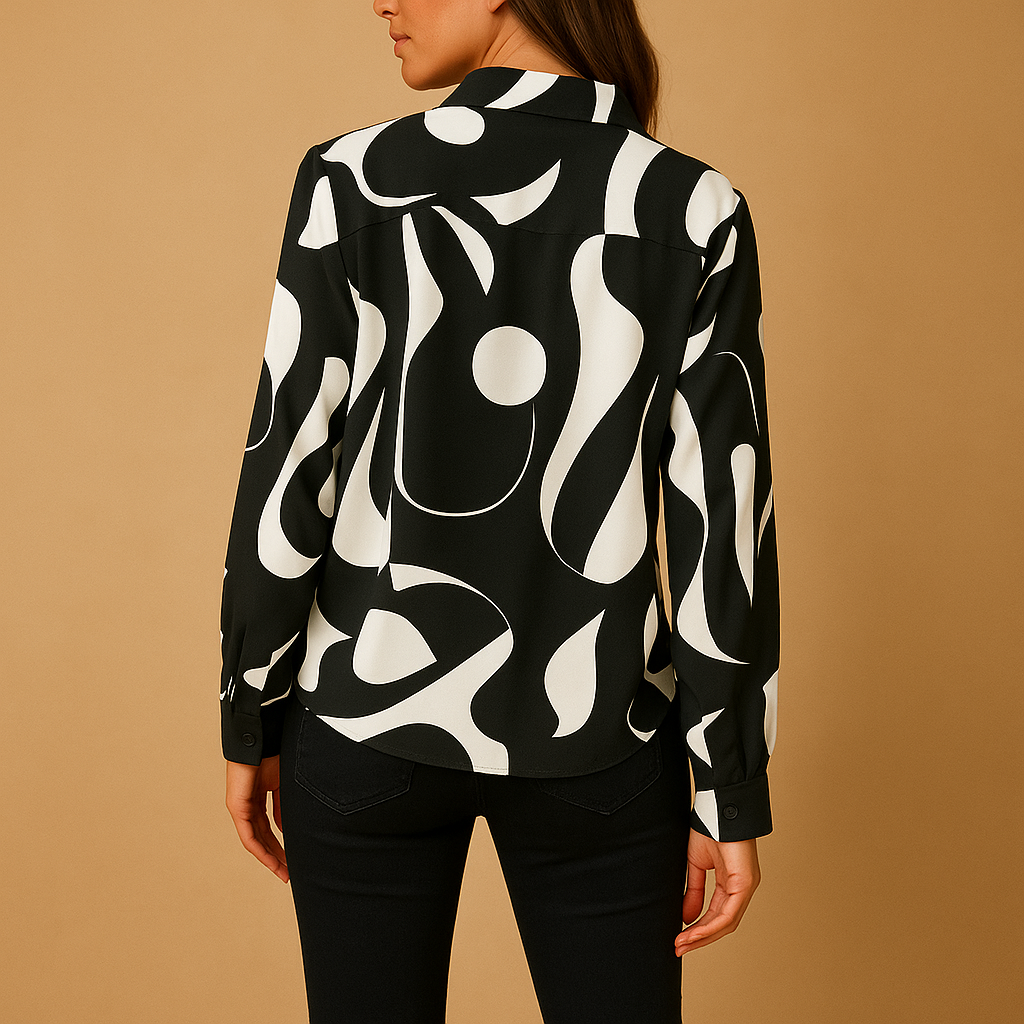 Women’s elegant printed blouse with a smooth fit and refined design, suitable for casual outfits and formal occasions.