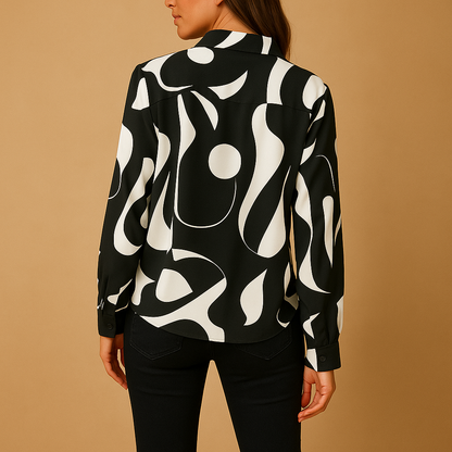 Women’s elegant printed blouse with a smooth fit and refined design, suitable for casual outfits and formal occasions.