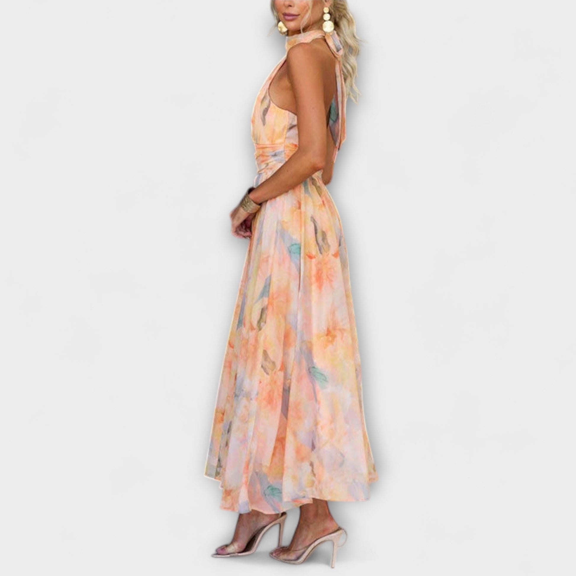 Woman wearing a floral dress on a white background