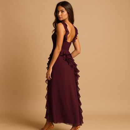 Women’s maxi dress with adjustable straps, asymmetrical ruffles and high slit, perfect for formal events, semi-formal occasions and summer evenings.