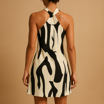 Women’s sleeveless printed summer dress with relaxed fit and lightweight design, perfect for beach days, vacations, and warm weather.