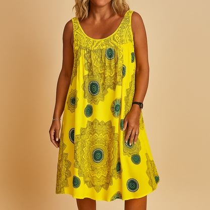 Women’s sleeveless summer dress with vibrant multicolor print and loose fit, ideal for holidays, terrace outings, and everyday warm weather wear.