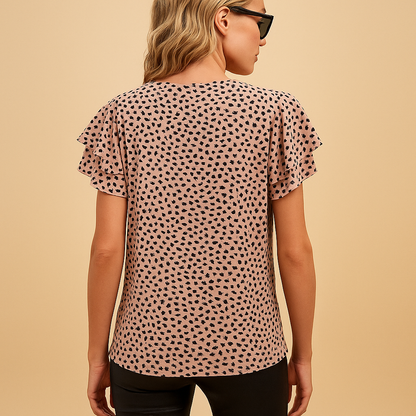 Stylish women’s printed top with a flowing and flattering fit, ideal for casual outings or elegant occasions.