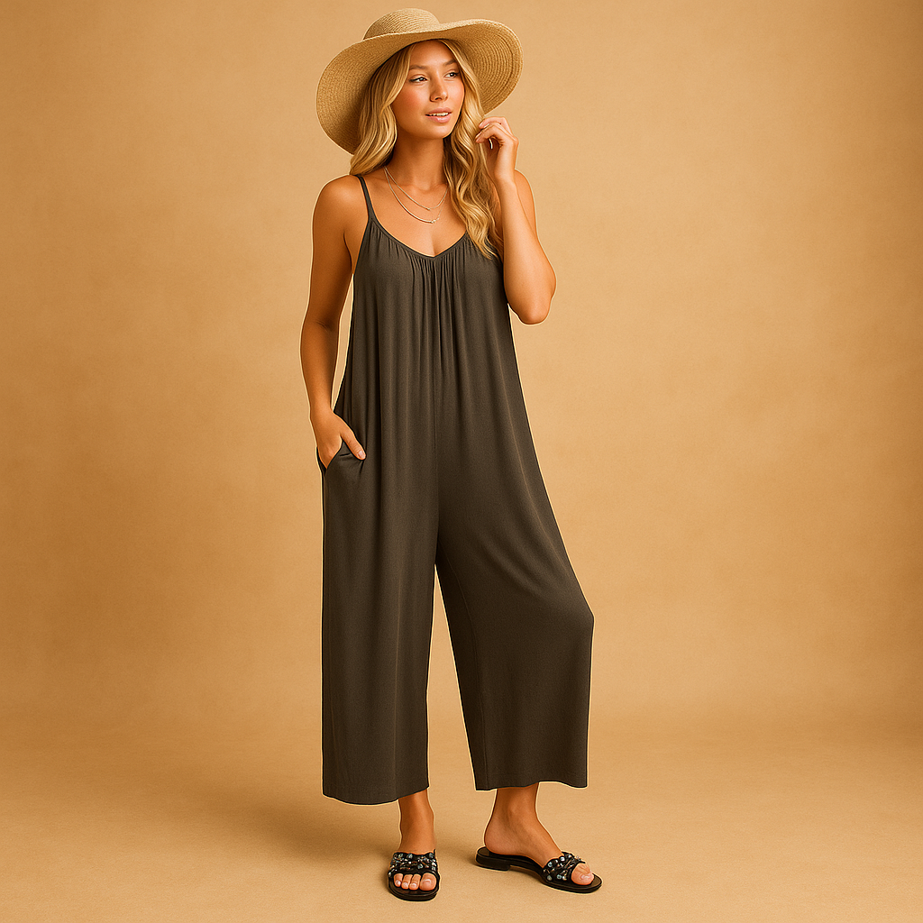 Woman wearing a loose summer jumpsuit with adjustable straps and an elastic waistband, ideal for holidays, parties, and warm days.